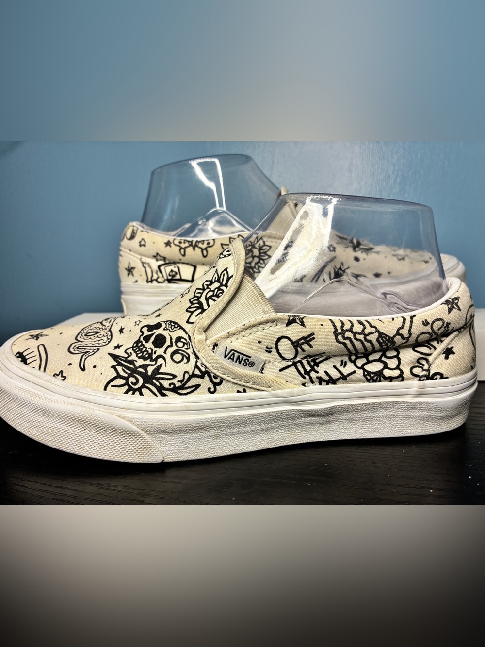 Vans Slip-On Sneakers in Cream with Black Doodle Graphics